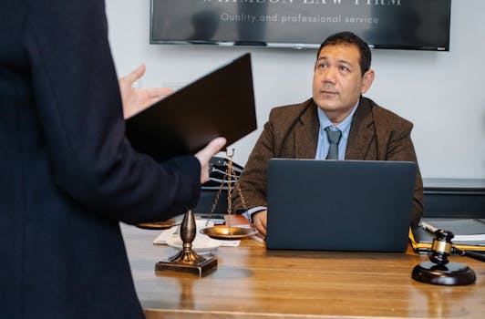 attorney discussing case with a client