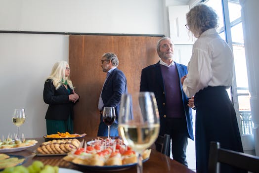 image of a networking event with professionals engaged in conversation